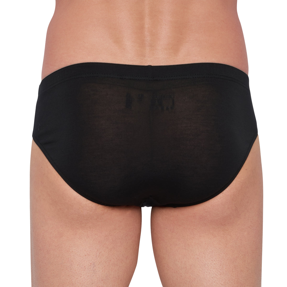 Vue arrière d’un slip taille basse Tencel noir, conçu en tissu léger et hypoallergénique pour un usage quotidien.